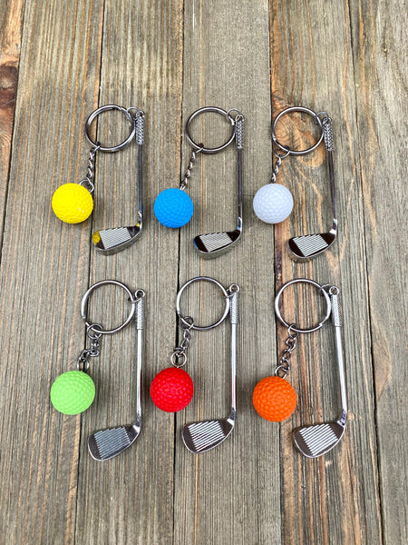 Golf club and ball set keychain. Silver Metal Golf club keychain. Orange Golf ball keychain. Golf players keychain. Golf coach keychain. Sports keychain.