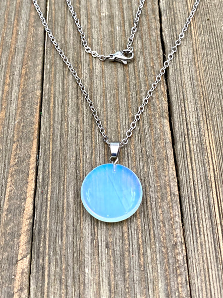 An Eye catching synthetic Opal stone round shape Pendant Necklace with High Quality No Fade Non Tarnish Hypoallergenic Stainless Steel chain