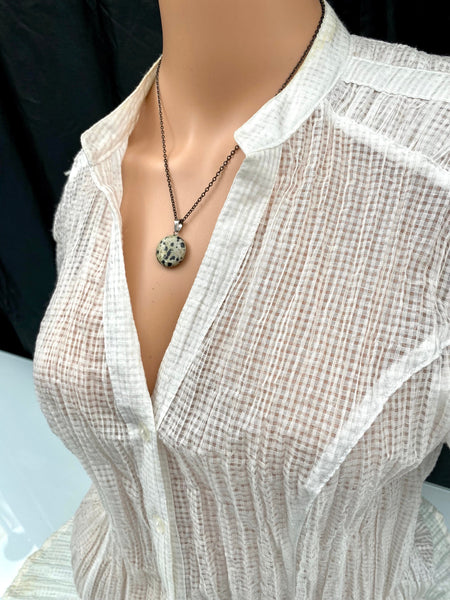 An Eye catching Dalmatian stone round shape Pendant Necklace with High Quality No Fade No Tarnish Hypoallergenic Black Stainless Steel chain